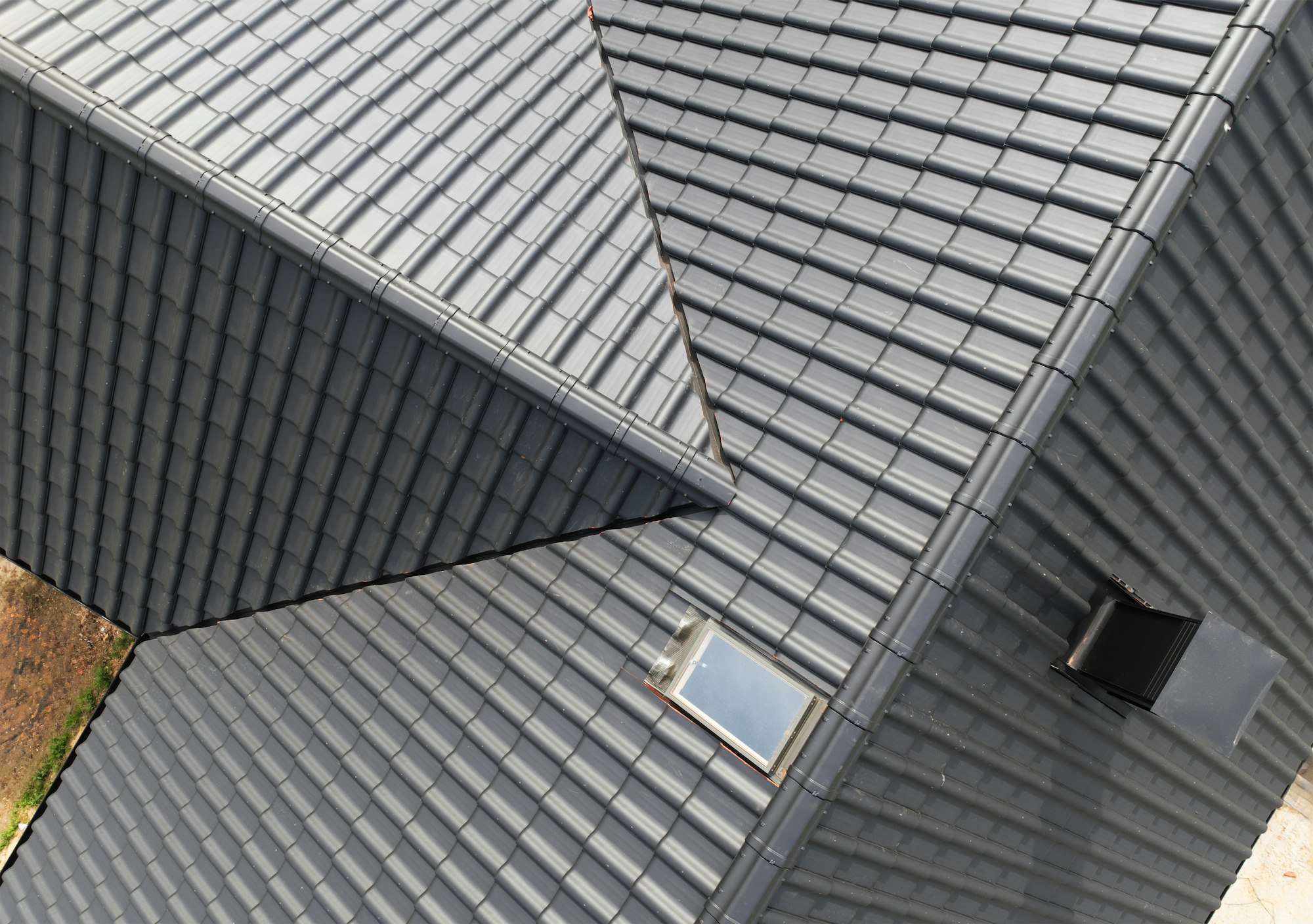 New House Roof Made From Black Roof Tiles