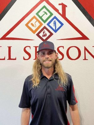 All Seasons Roofing & Restoration employee.