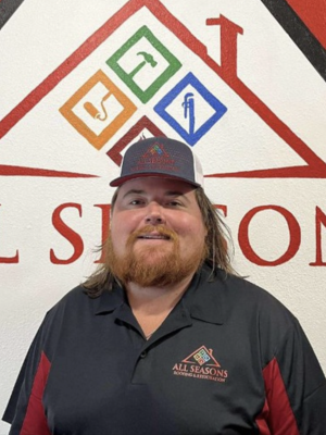All Seasons Roofing & Restoration employee.