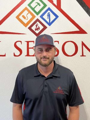 All Seasons Roofing & Restoration employee.