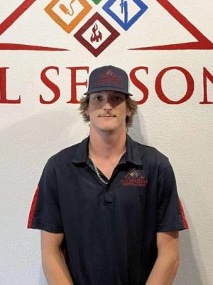 All Seasons Roofing & Restoration employee.