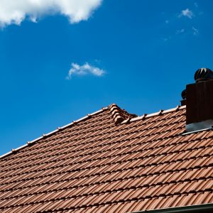 new red tiles roof and blue sky